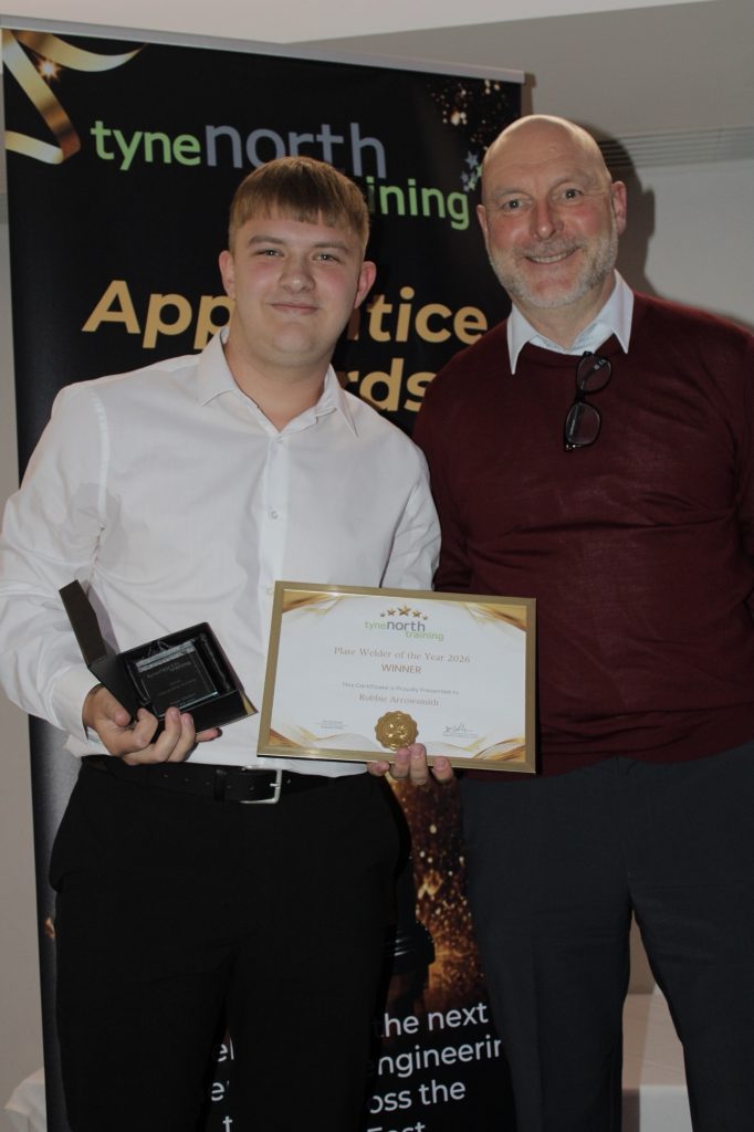 Robbie receives his award from Owen McAteer, Enginuity photo credit ljmayxphotography